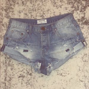 Distressed denim shorts